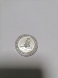 Серебряная монета " Собака" 16,04